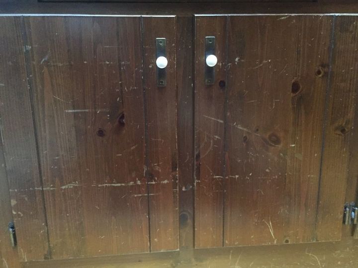 q what is the easiest way to get rid of scratches on wooden cabinets