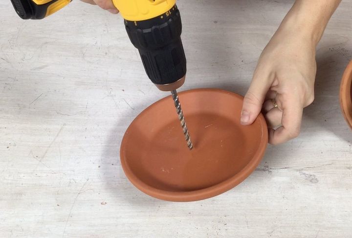 3 ideas to use terracotta pots you definitely haven t seen before, Step 9 Drill a hole in a terracotta saucer