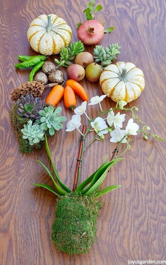 una decoracin de mesa otoal con suculentas y otros elementos naturales