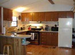 q need ideas to renovate particle board kitchen cabinets