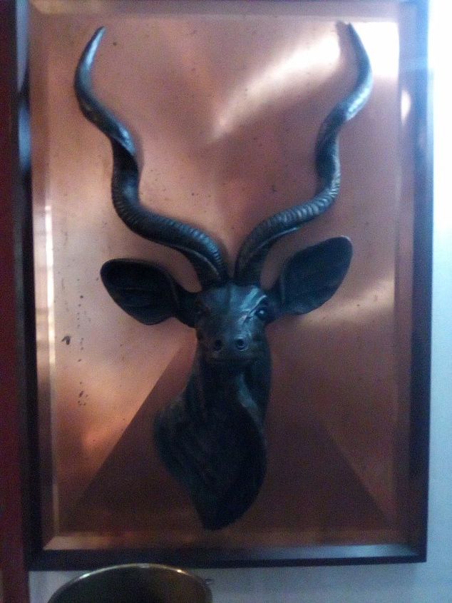 q how do i clean this magnificent copper plaque of a kudu bull