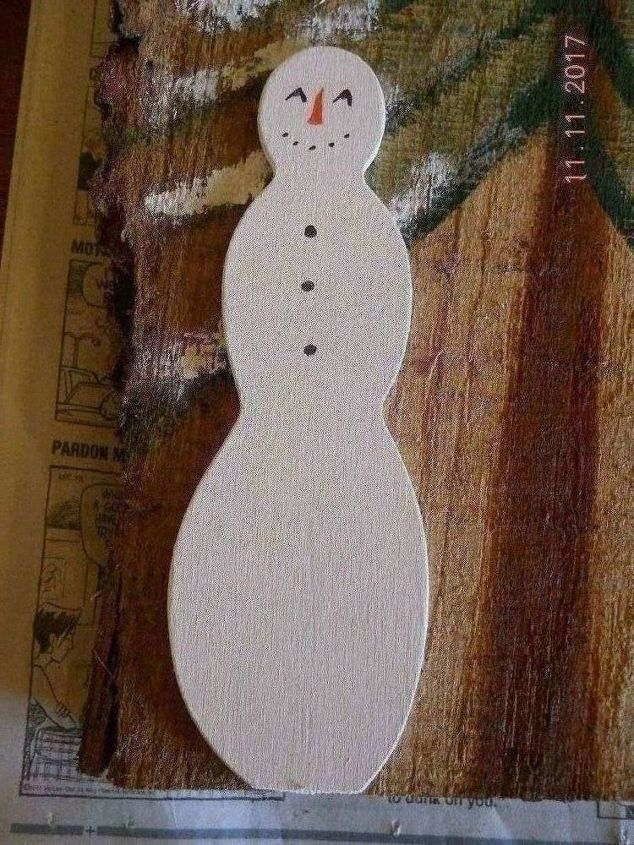 natural elements project snowman enjoying snow