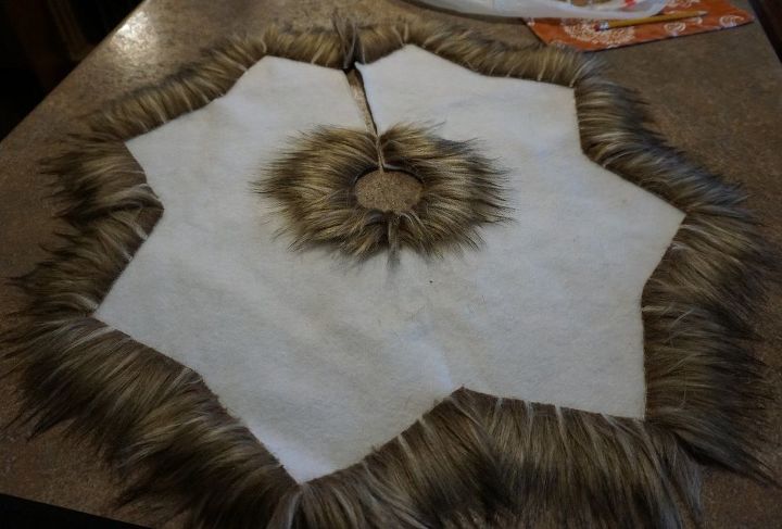 a fur trimmed tree skirt