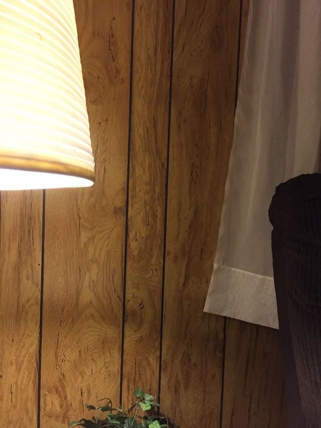 What color wood floors do I put down with wood paneling on walls
