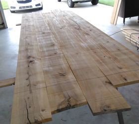 an extremely large dining table, This is the table top being glued up