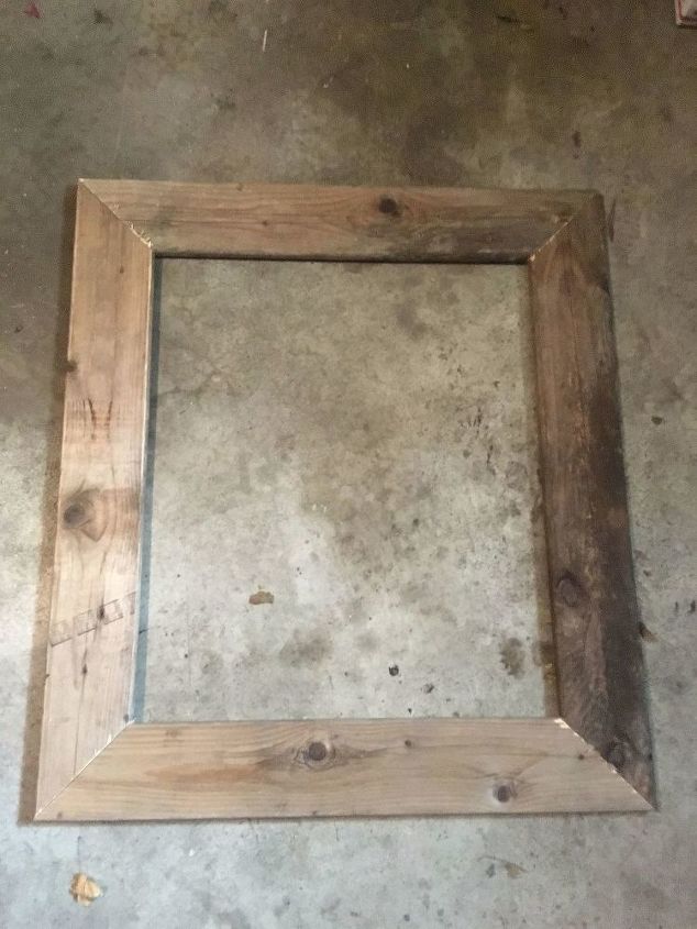 planked reclaimed wall treatment with picture frame