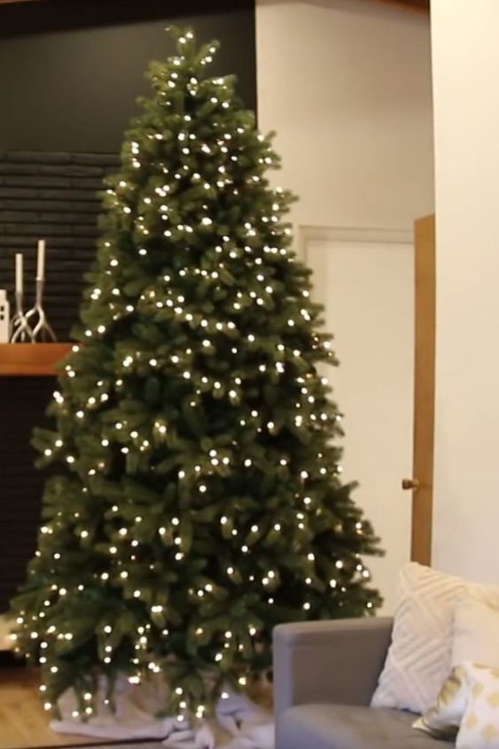 decorating a rustic woodland christmas tree