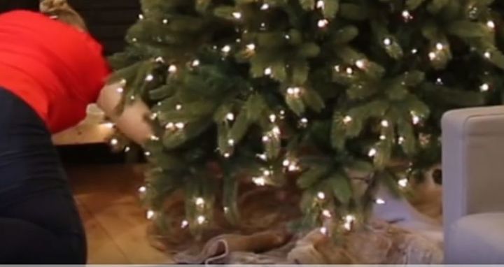 decorating a rustic woodland christmas tree