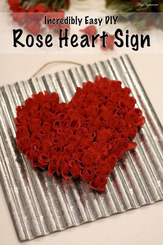 s tired of wreaths here are 11 cute ways to decorate with faux flowers, Hang A Heartwarming Rose Sign