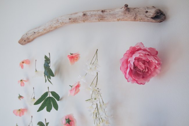 30 mesmerizing ways to decorate with artificial flowers, Add A Serene Ornament To Your Wall