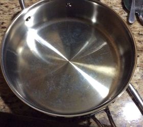 how do i remove white spots from stainless steel pots and pans