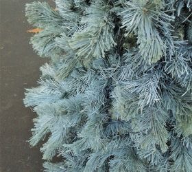 give an old worn out christmas tree new life with a little paint
