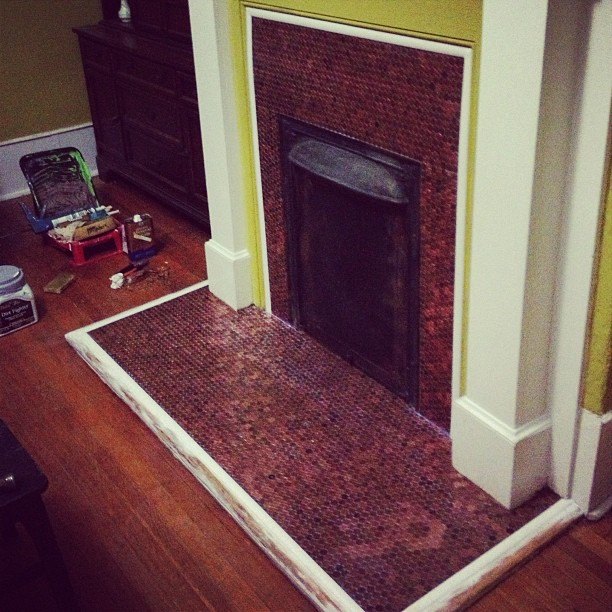s 12 cozy fireplaces to build for your love minus the expense, Put Up A Glimmering Wall Of Pennies