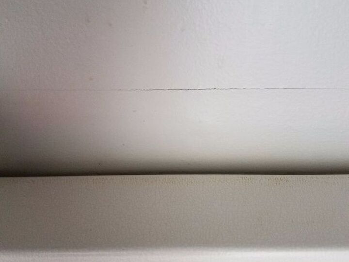 q i have some sheet rock paper popping away can i spackle over top and
