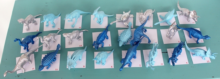 s 25 advent calendar ideas that are so cute, Dino Advent Make This Dinosaur Advent Calend