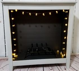 turn an old bookshelf into a gorgeous faux fireplace