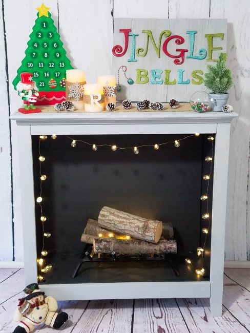 turn an old bookshelf into a gorgeous faux fireplace