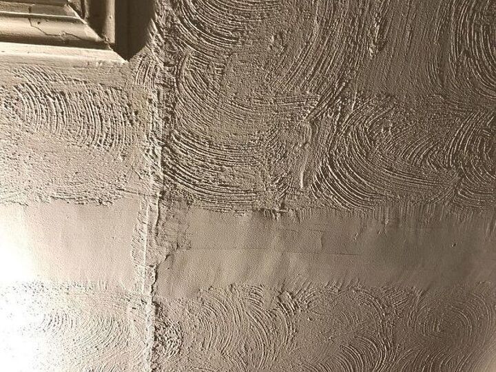 q we need suggestions on how to disguise an unevenly textured ceiling