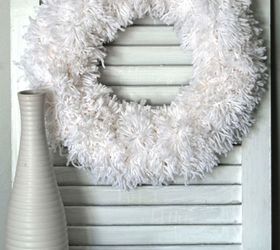 s make your home a winter wonderland with these stunning ideas, Easy Winter Pom Pom Wreath