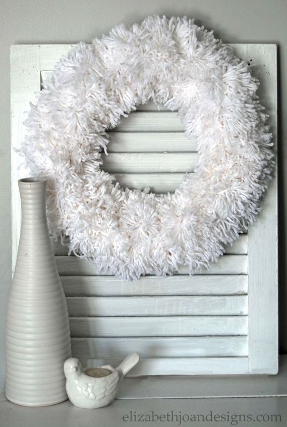 s make your home a winter wonderland with these stunning ideas, Easy Winter Pom Pom Wreath