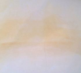 removing yellow stains from a white countertop