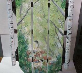 a painted sled for christmas with chickadees and nuthatch