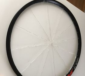 repurposing bicycle wheel holiday wreath