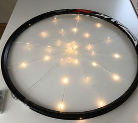 repurposing bicycle wheel holiday wreath