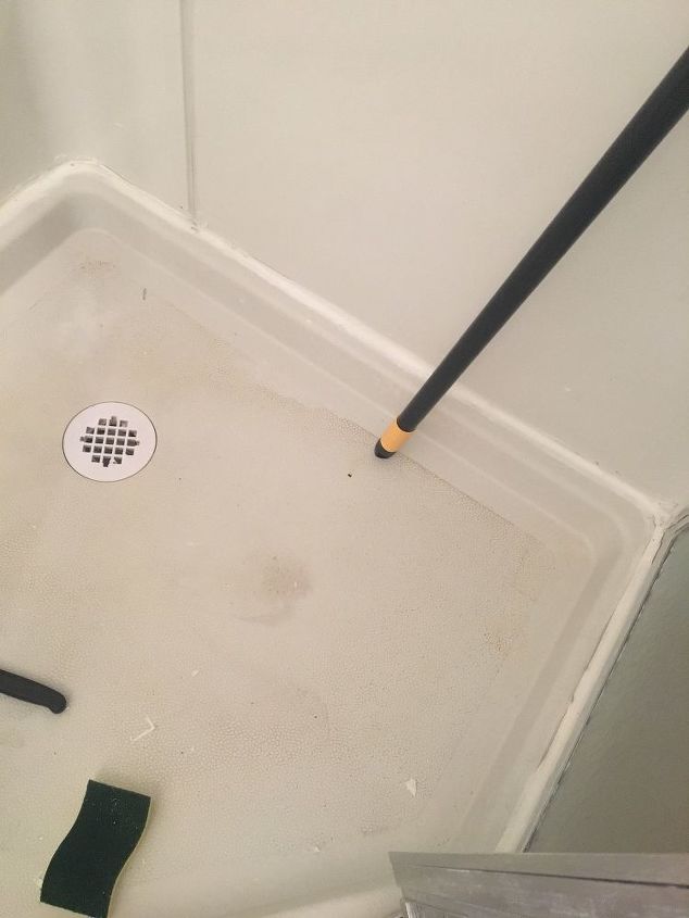 how do i get a fiberglass shower floor clean