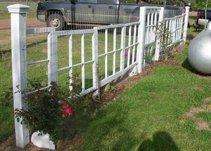 30 wonderful ways you can upcycle old windows, Stack them side by side into a yard fence