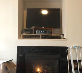 tv cut out over fireplace need some ideas