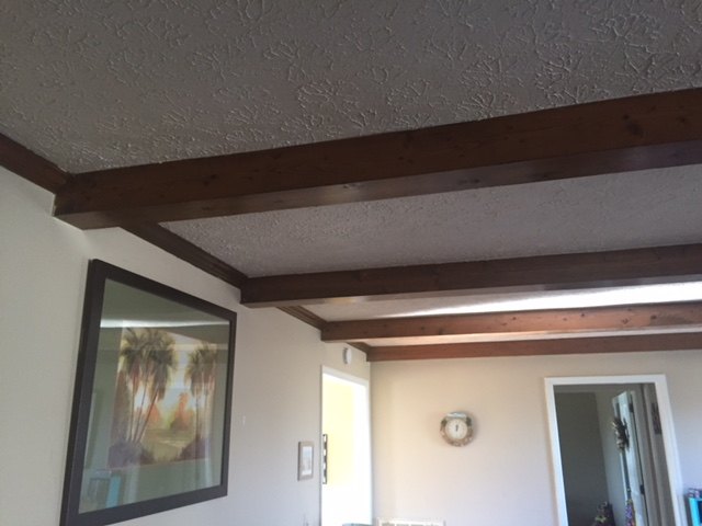 q how can i lighten these beams the room is small and looks so dark