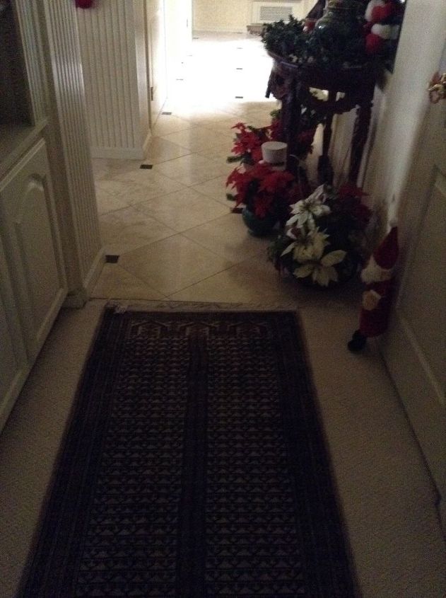 q wood floor next to travertine or porcelain like wood