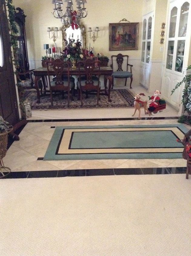 q wood floor next to travertine or porcelain like wood