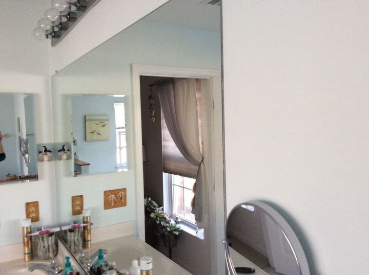 q how to frame a large mounted bathroom mirror