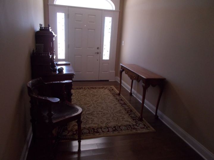 q what will work with this antique desk in my entrance hall