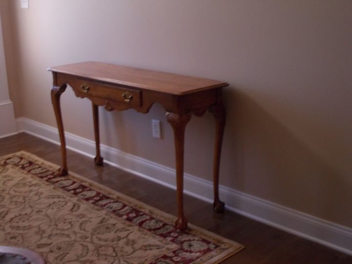 q what will work with this antique desk in my entrance hall