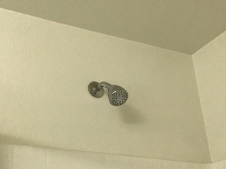 q how can i get the shower head off