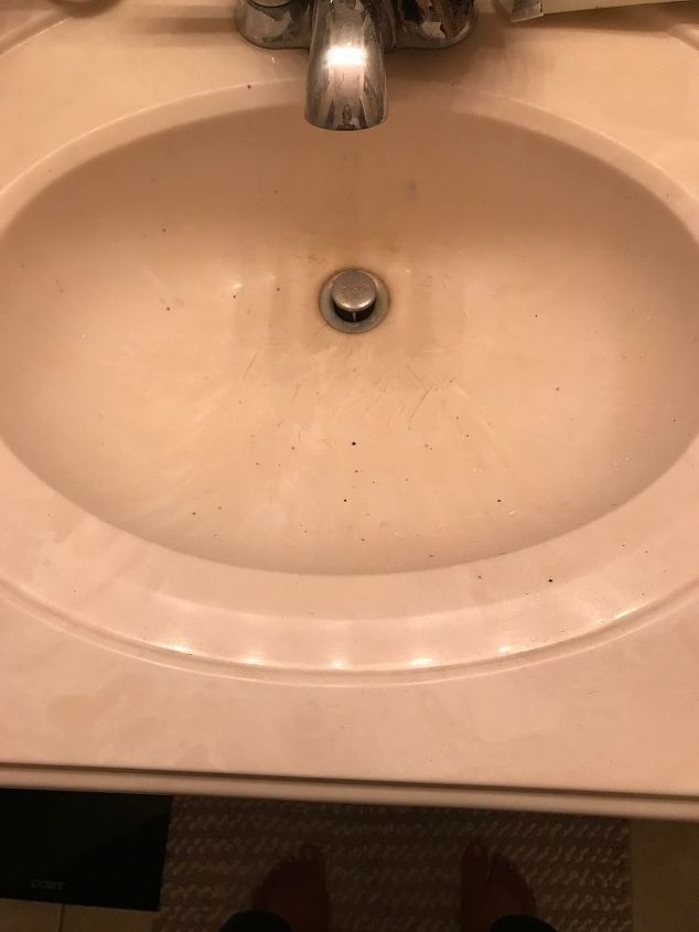 q how do you fix this scratched up sink without buying a new countertop
