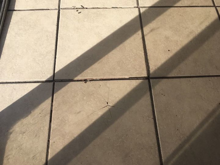 any ideas on a quick fix cracked tiles in kitchen floor