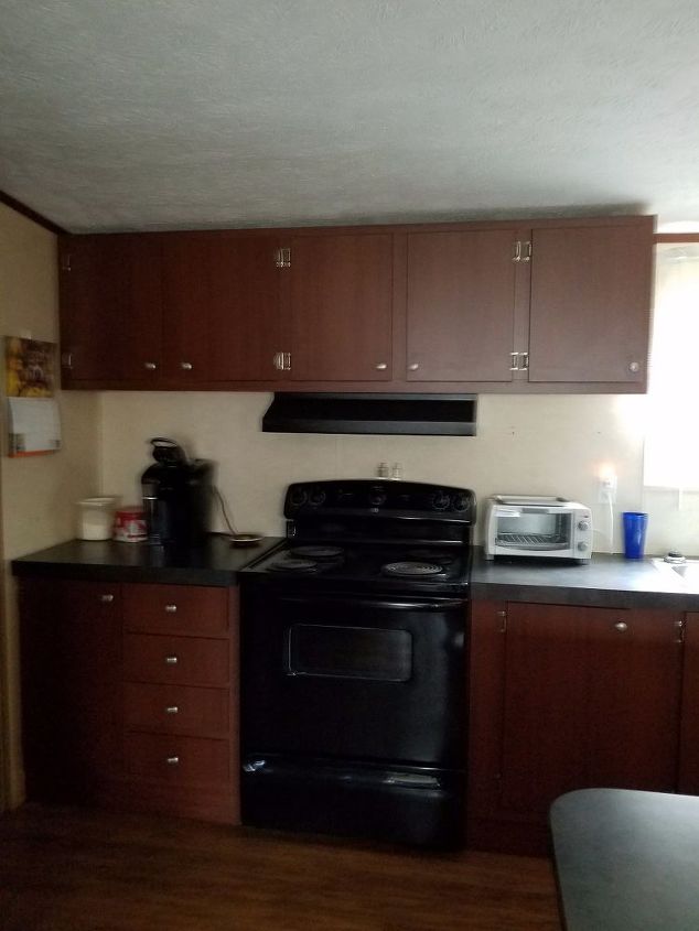 q how do i brighten up a kitchen on a tight budget