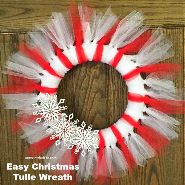 s 25 christmas wreath ideas you don t want to miss this year, Candy Cane Colored Tulle Wreath