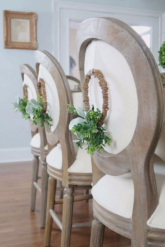 s 25 christmas wreath ideas you don t want to miss this year, Elegant Chair Back Wreath