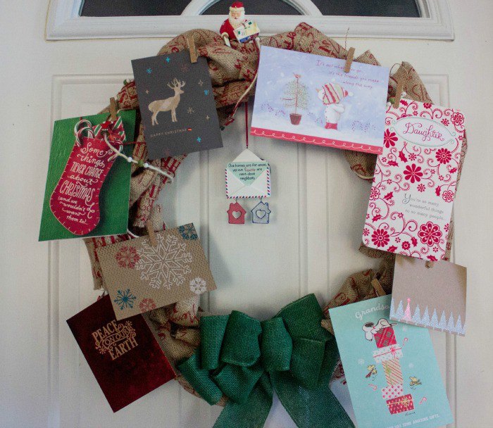 s 25 christmas wreath ideas you don t want to miss this year, Burlap Christmas Card Holder Wreath