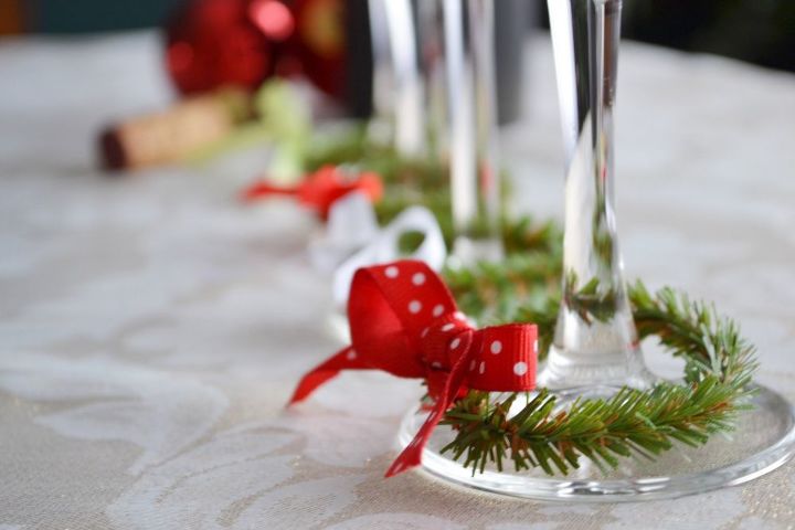 s cuddling up at home with a bottle of wine then try these projects, Tie Cute Wreath Charms Around Your Glasses