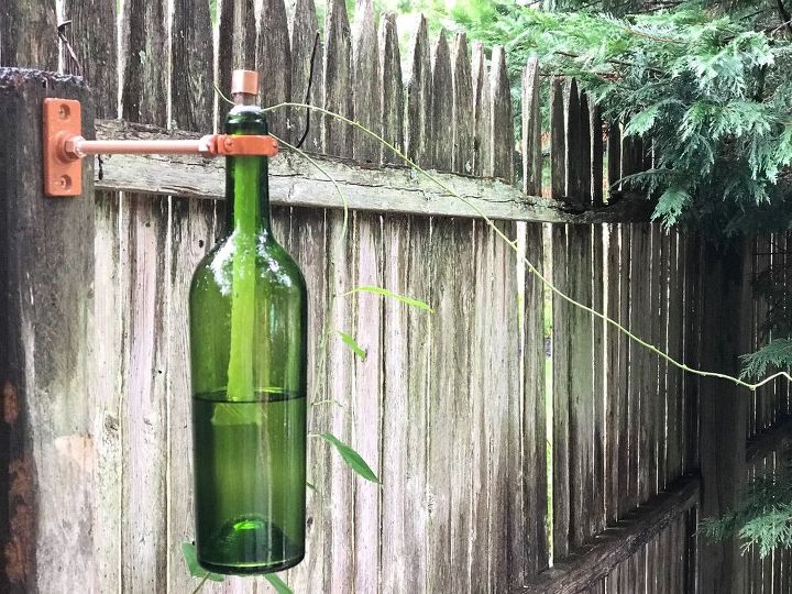 s cuddling up at home with a bottle of wine then try these projects, Make a Hanging Tiki Torch
