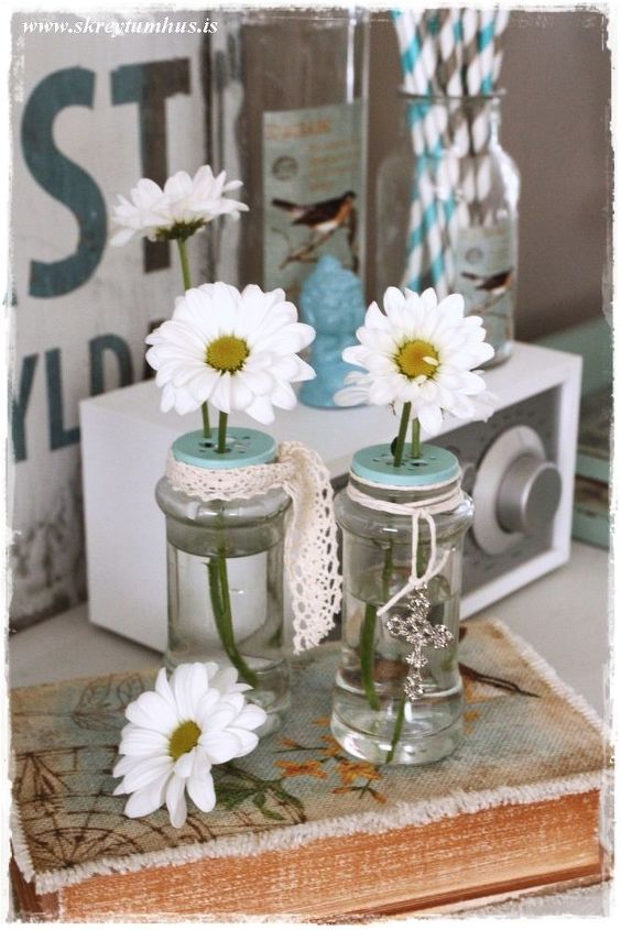 s these amazing vase ideas will blow your guests away, Reuse empty spice bottles as whimsical vases