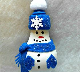 s 30 different ways to diy an adorable snowman this winter, Repurpose an old light bulb