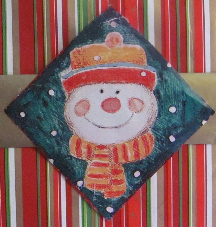 create christmas artwork using leftover wrapping paper