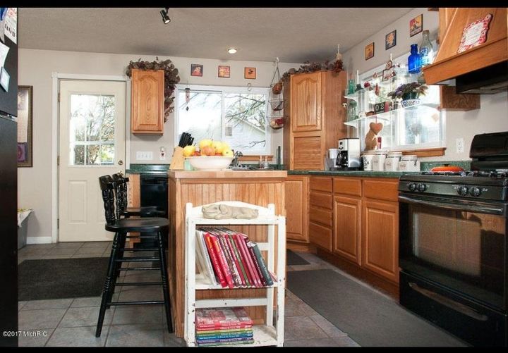 q what to do with a kitchen with wood cabinets and green countertops